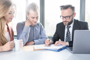 Family couple consultations with a lawyer or insurance agent.